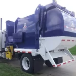 Blue and white Under CDL truck